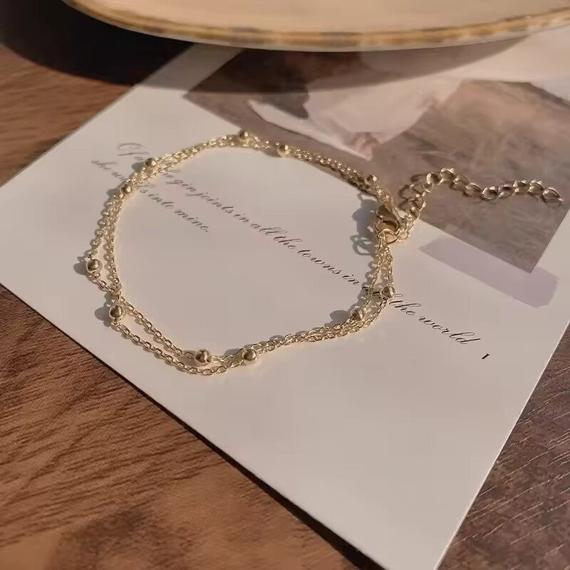 Fashion double-layer small round pearl golden bracelet