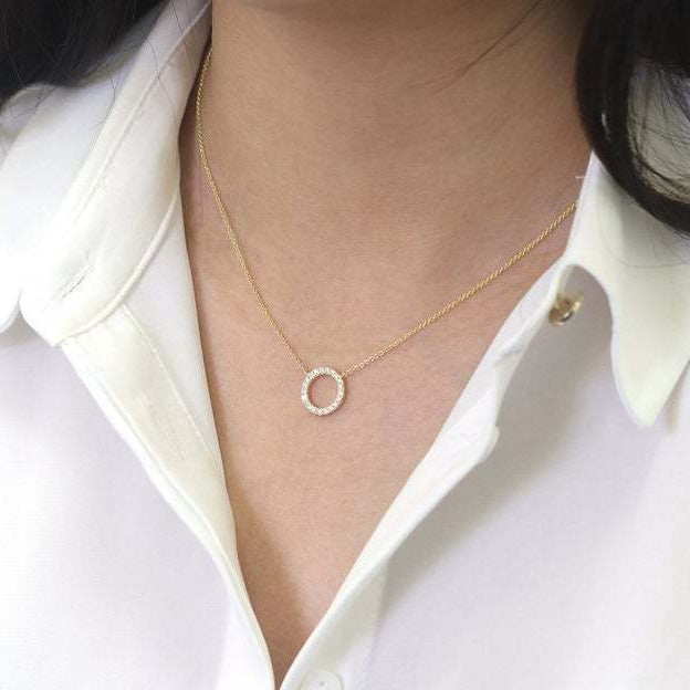 Geometric circular ring with diamond inlay and bangle chain for the collarbone